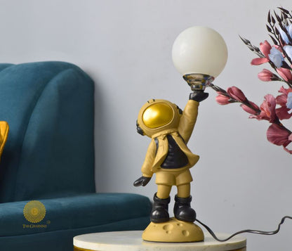 Polyresin Astronaut Holding Bulb - The Gharnish - A Unit of Satkala Creations