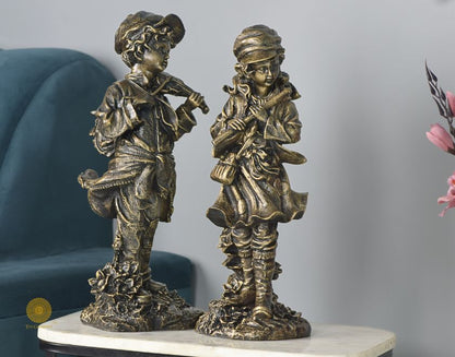 Elegant antique musical couple statue by The Gharnish, showcasing abstract figurines in a timeless and artistic design.
