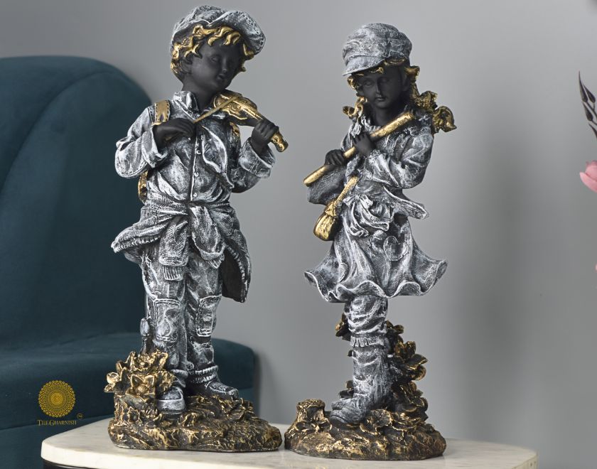 Abstract musical couple statue by The Gharnish, showcasing an elegant antique figurine with intricate details and artistic design.