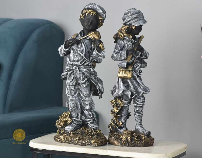 Elegant antique musical couple statue by The Gharnish, featuring abstract figurines with intricate details.