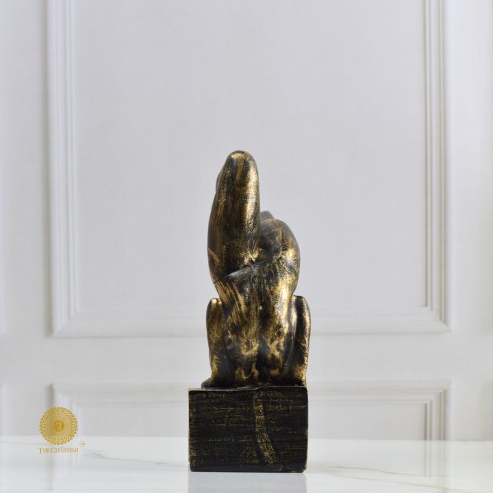 Ancient Gold Acribat Gymnast figurine by The Gharnish, abstract gold sculpture of a gymnast in dynamic pose.