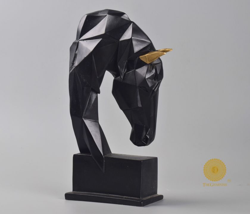 Abstract diamond-cut horse head statue by The Gharnish, detailed animal figurine with geometric design.