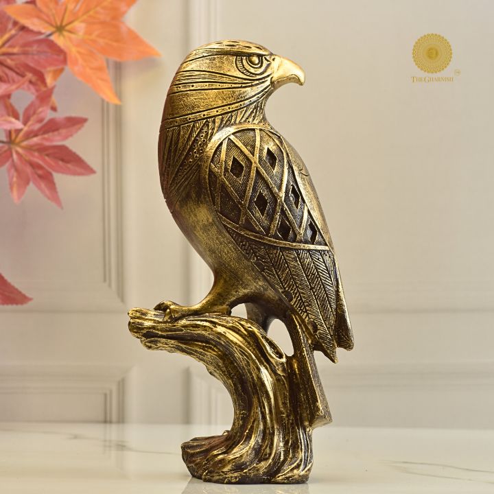 Majestic Garuda animal figurine by The Gharnish, detailed sculpture with intricate feathers and fierce expression.