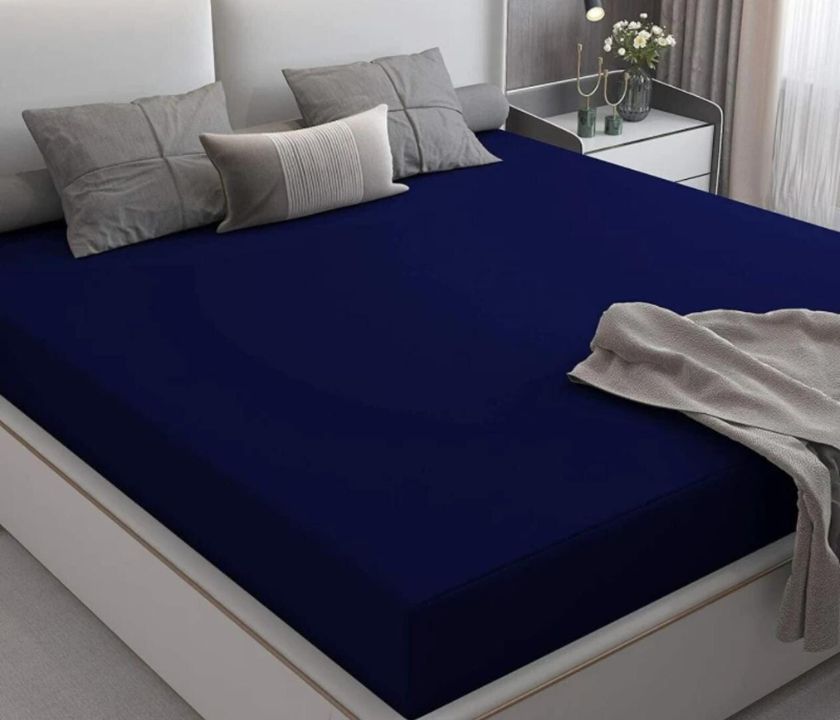 Premium quality terry cotton waterproof mattress protector from The Gharnish, showing soft, quilted fabric and waterproof layer.