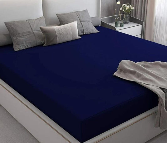 Premium quality terry cotton waterproof mattress protector from The Gharnish, showing soft, quilted fabric and waterproof layer.