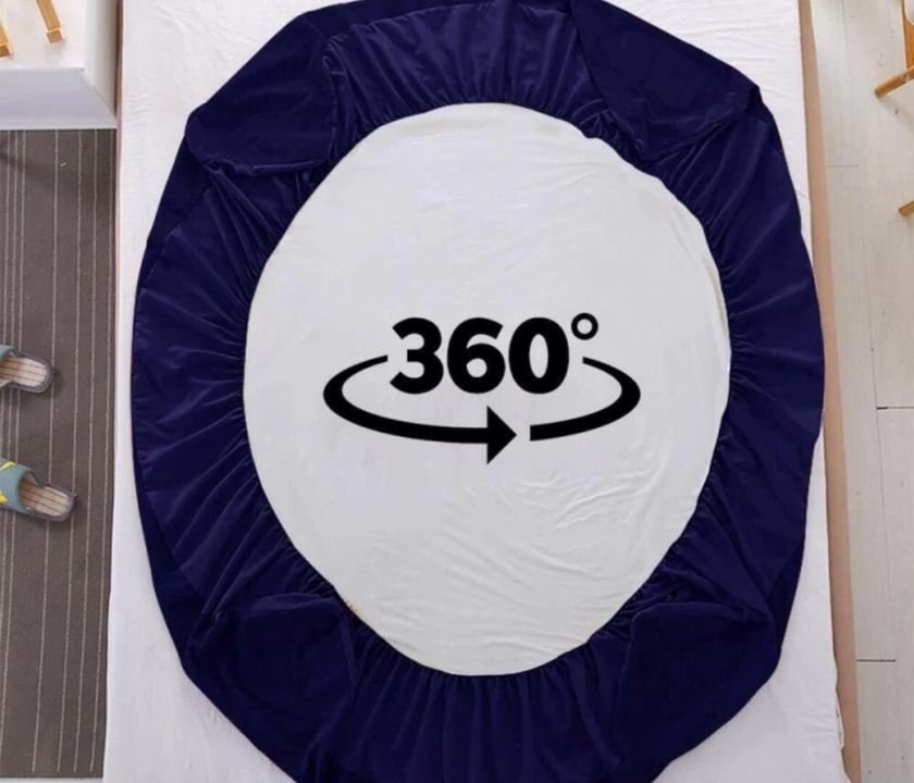 Premium quality terry cotton waterproof mattress protector from The Gharnish, showing soft terry surface and waterproof fabric.