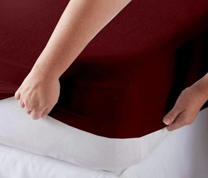 Premium quality Terry cotton waterproof mattress protector from The Gharnish, soft bedding cover for mattress protection.