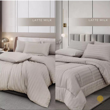 Cream and gray striped premium bedding comforter from The Gharnish, neatly arranged on a bed with soft fabric texture