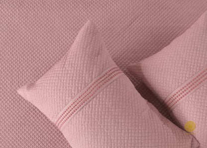 Premium quilted bedding set by The Gharnish featuring 8 pieces with soft, luxurious fabric and elegant design for a cozy bedroom.