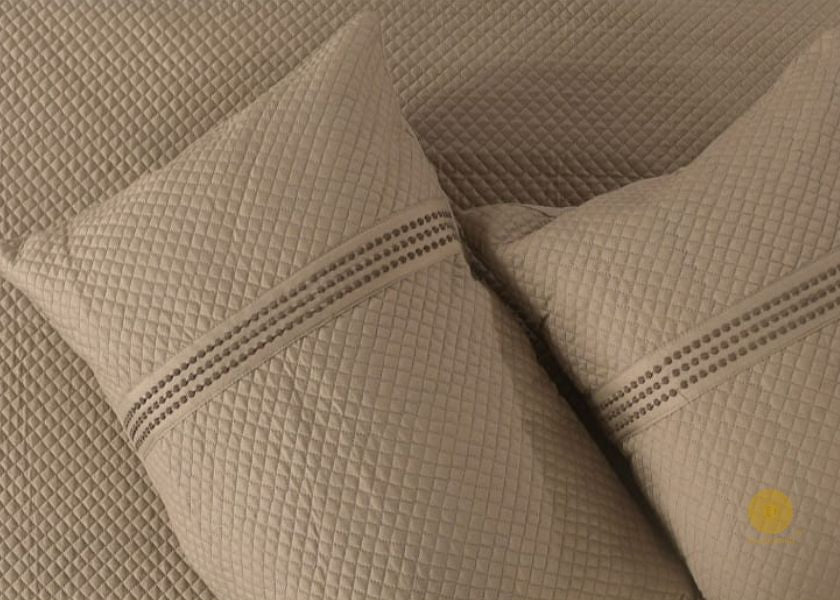 Premium quilted 8-piece bedding set by The Gharnish, featuring soft, stylish comforter and pillowcases for a cozy bedroom look.