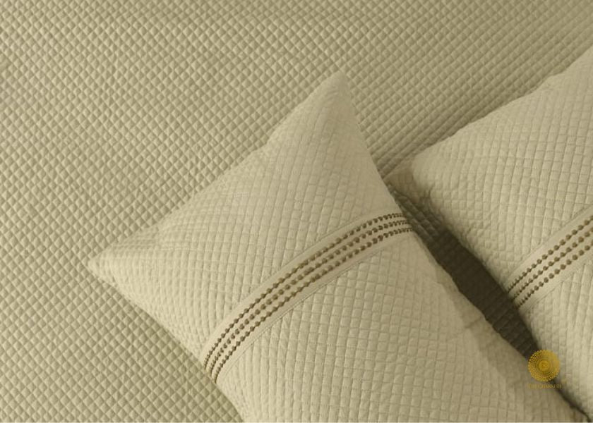 Premium quilted bedding set by The Gharnish, 8-piece bedding including comforter, sheets, and pillowcases, in a stylish pattern.