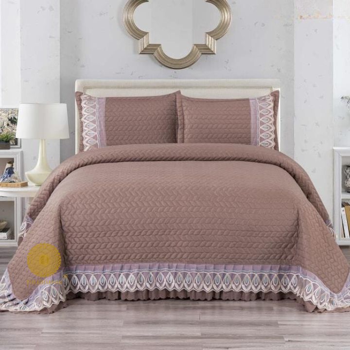 Astria Premium quilted and laced bedding bedcover by The Gharnish, featuring intricate quilting and elegant lace details.