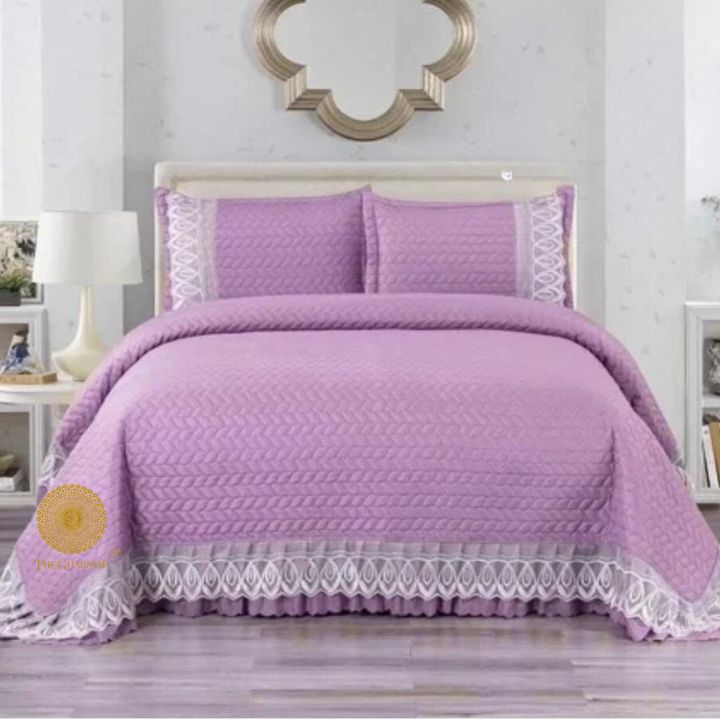 Astria Premium quilted and laced bedcover by The Gharnish, featuring intricate quilting and elegant lace details on a bedding set.