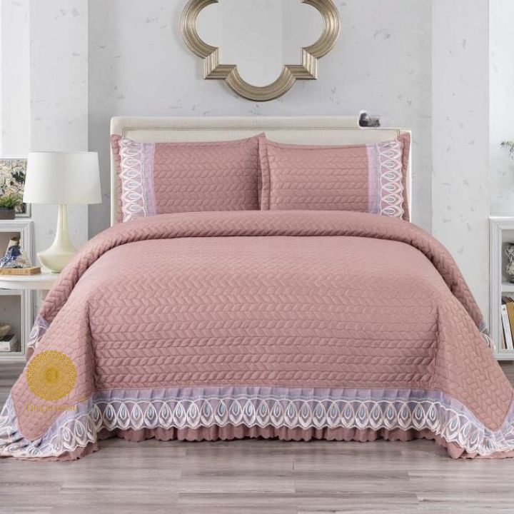 Astria Premium quilted and laced bedcover by The Gharnish, featuring intricate quilting and elegant lace details on a luxurious bedding set.