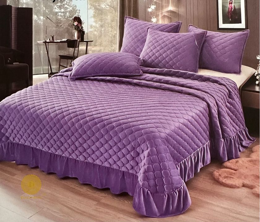 Velvet warm quilted bedcover set with frill design by The Gharnish, showcasing luxurious bedding style and intricate quilting details.