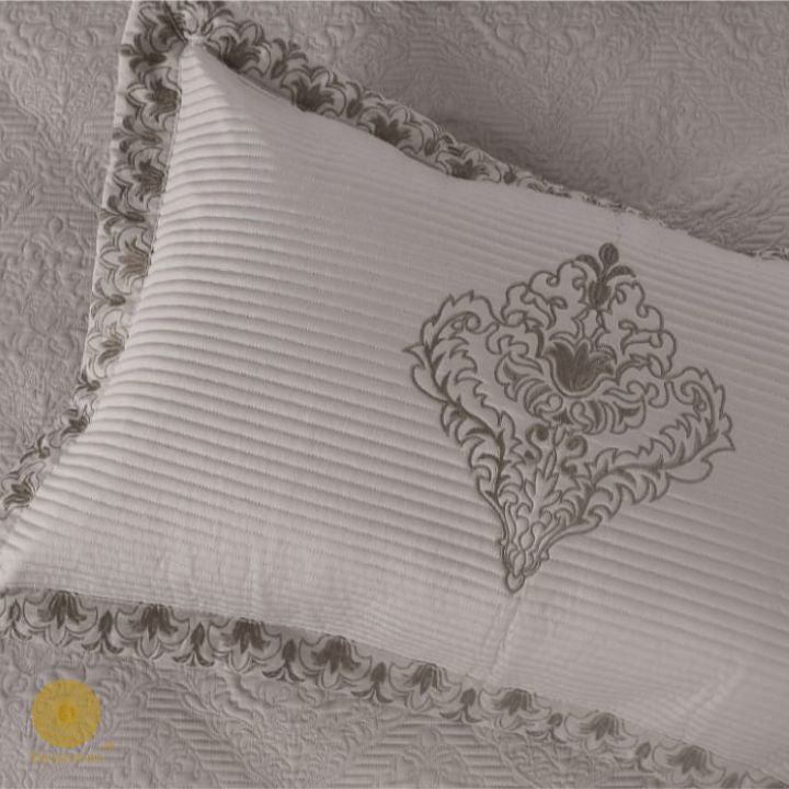 Estorado Premium Cotton Quilted Bedcover by The Gharnish featuring a soft, textured bedding design in neutral tones.