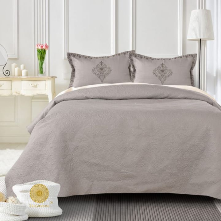 Estorado Premium Cotton Quilted Bedcover from The Gharnish, soft, plush bedding with a detailed quilted pattern in neutral tones.