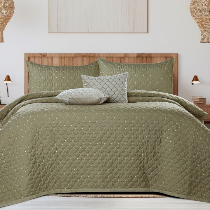 Luxury 5-piece quilted bedding set by The Gharnish including bedcover, pillow covers, and cushion covers in elegant fabric.