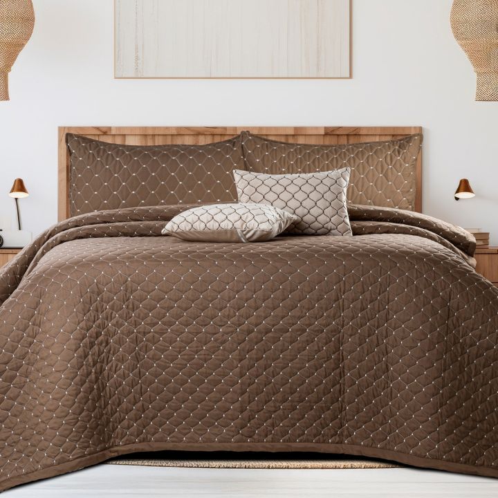 Luxury 5-piece quilted bedding set by The Gharnish, including bedcover, pillow, and cushion covers with elegant stitching and textures.
