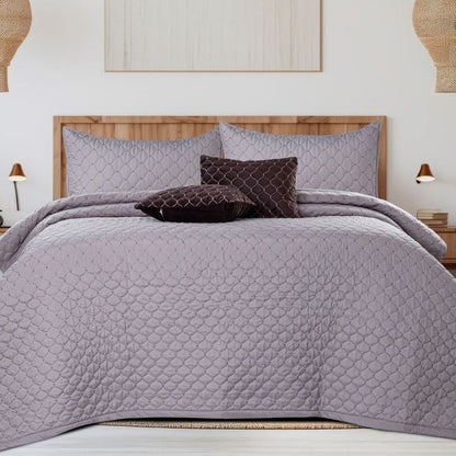 Luxurious 5-piece quilted bedding set by The Gharnish with bedcover, pillow, and cushion covers in elegant design.