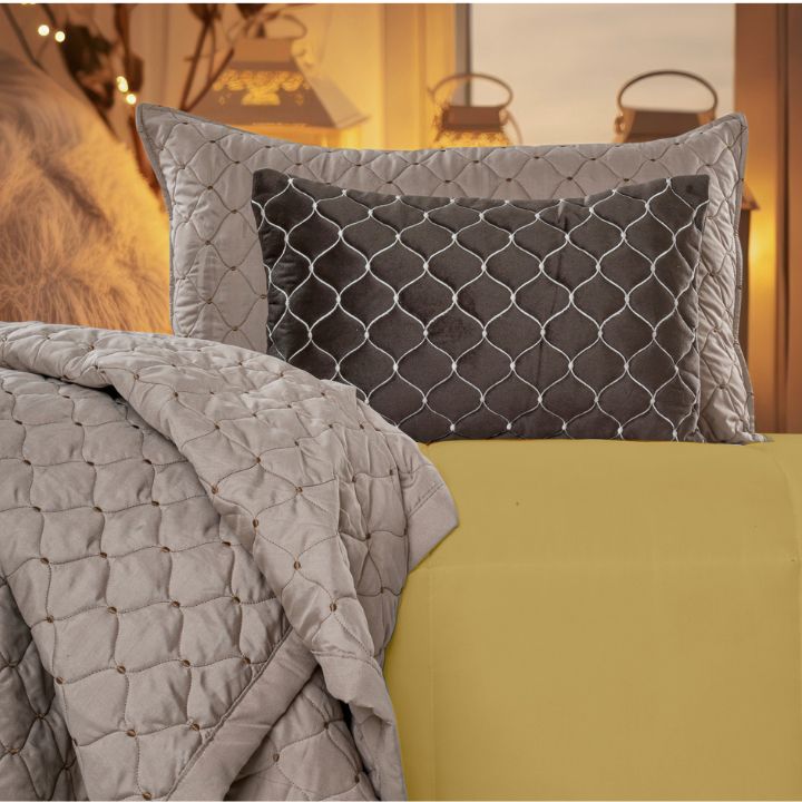 Luxury 5-piece quilted bedding set by The Gharnish, includes bedcover, pillow, and cushion covers with elegant quilting details.