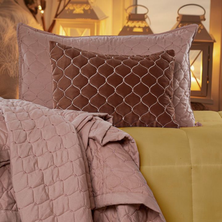 Luxury 5-piece quilted bedding set from The Gharnish with bedcover, pillow, and cushion covers in elegant fabric and design.