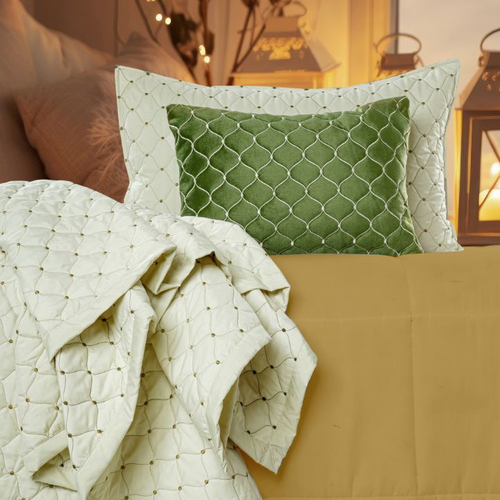 Luxury 5-piece quilted bedding set from The Gharnish, includes bedcover, pillow covers, and cushion covers in elegant design.