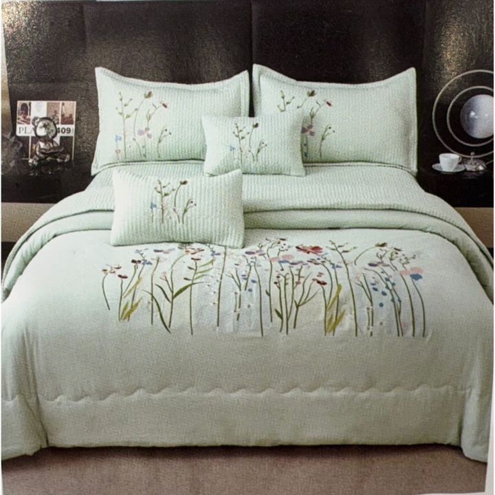 Luxury bedding 6-piece set by The Gharnish featuring elegant, soft bedding with intricate patterns and plush fabric.