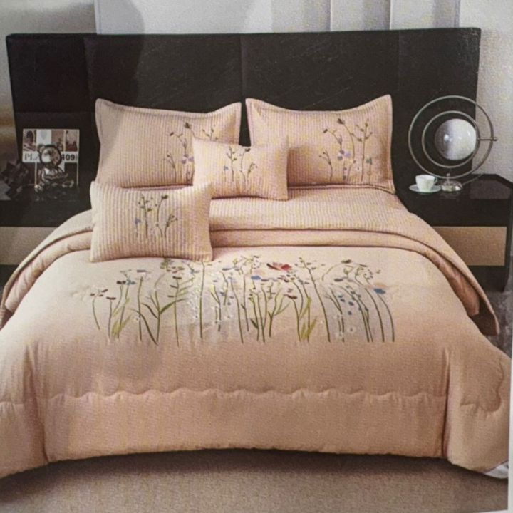 Luxury bedding 6-piece set by The Gharnish featuring soft, elegant bed linens and decorative pillows in a stylish bedroom setting.