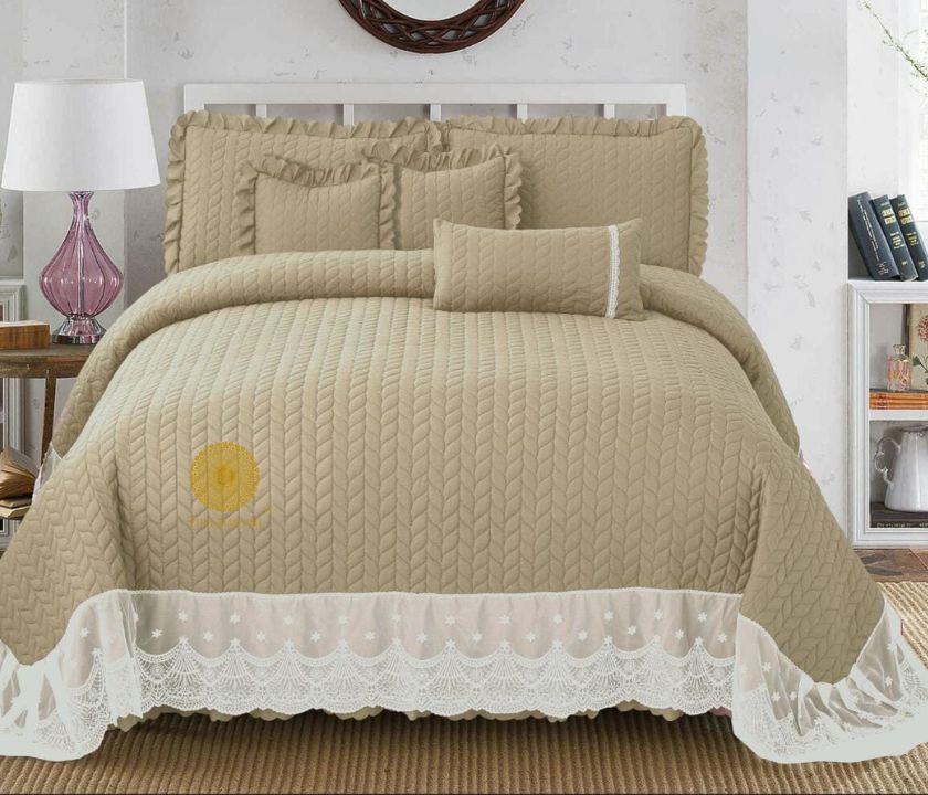 Luxury quilted king size bedding set by The Gharnish, including 6 pieces of elegant bedcovers with intricate stitching.