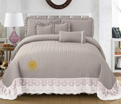 Luxury quilted king size bedcover set by The Gharnish, featuring a stylish bedding design with six matching pieces.