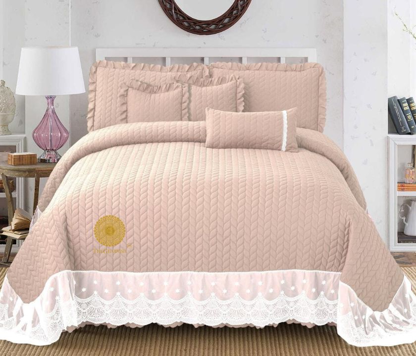 Luxury quilted king size bedcover set by The Gharnish, featuring elegant bedding with intricate stitching and plush fabric.
