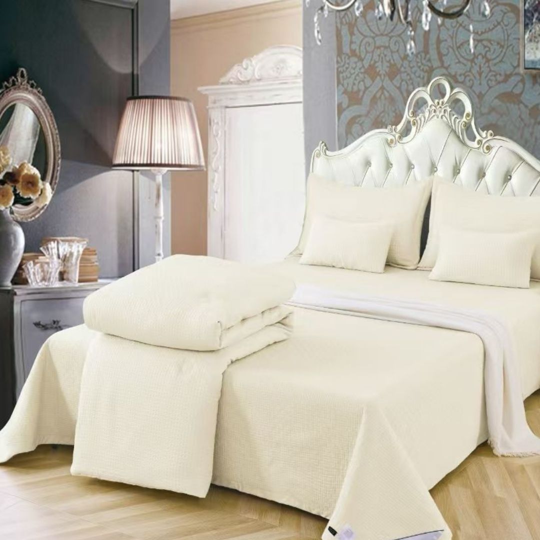 Luxury quilted and patterned 6-piece bedding set by The Gharnish, imported summer collection, featuring elegant fabric and intricate design.