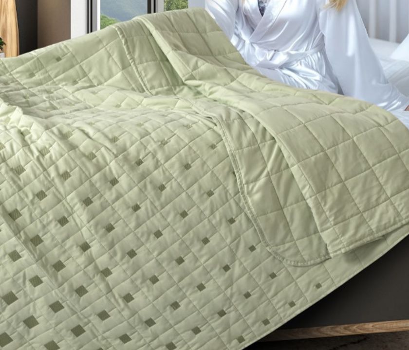 Luxury quilted bedcover 6-piece bedding set by The Gharnish, featuring elegant stitched design and plush fabric.