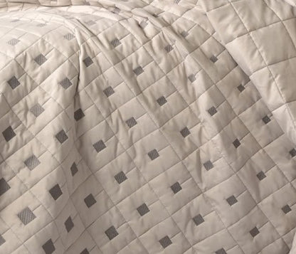 Luxury quilted bedcover 6-piece bedding set by The Gharnish, featuring elegant stitching and plush fabric for a stylish bedroom look.