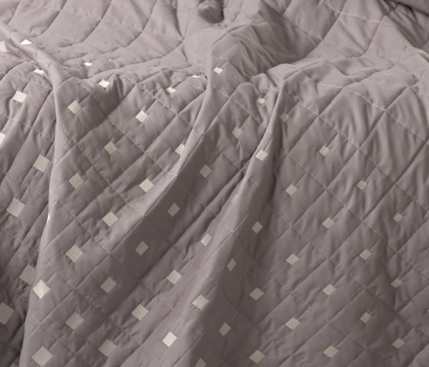 Luxury quilted bedcover 6-piece bedding set by The Gharnish, featuring elegant quilted design and matching pillowcases.