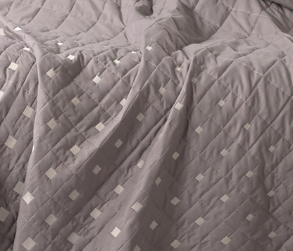 Luxury quilted bedcover 6-piece bedding set by The Gharnish, featuring elegant quilted design and matching pillowcases.