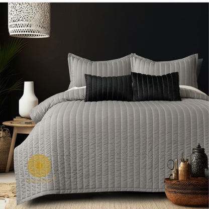 Moon Light designer quilted bedding set of 5 pieces by The Gharnish, showing soft fabric with moonlight pattern and decorative stitching.