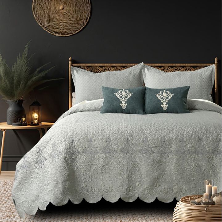 Mughlai quilted bedding set of 5 from The Gharnish, featuring intricate patterns and luxurious fabric for a royal bedroom look.