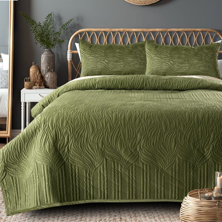 The Gharnish Pluton 3-piece quilted luxurious bedding set with elegant stitched patterns on a cozy bed.