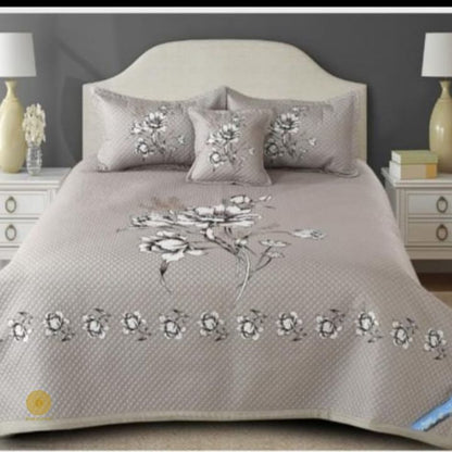 Premium quilted bedding 4-piece set by The Gharnish featuring soft, plush fabric and elegant stitching for cozy bedroom decor.