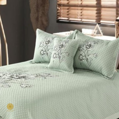 Premium quilted bedding 4-piece set by The Gharnish, featuring soft, plush fabric with stitched quilted pattern for cozy comfort.