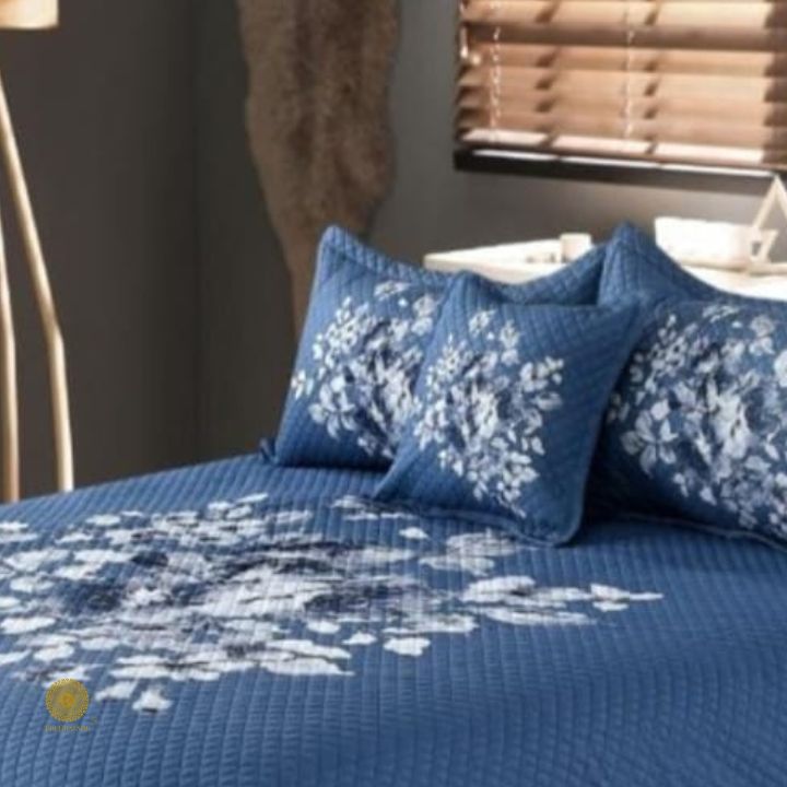Premium quilted bedding 4-piece set by The Gharnish featuring soft, plush fabric and decorative stitching for cozy bedroom decor.