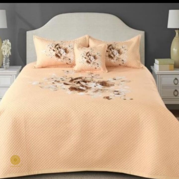 Premium quilted bedding 4-piece set by The Gharnish, featuring soft, stitched fabric with matching pillowcases and duvet cover.