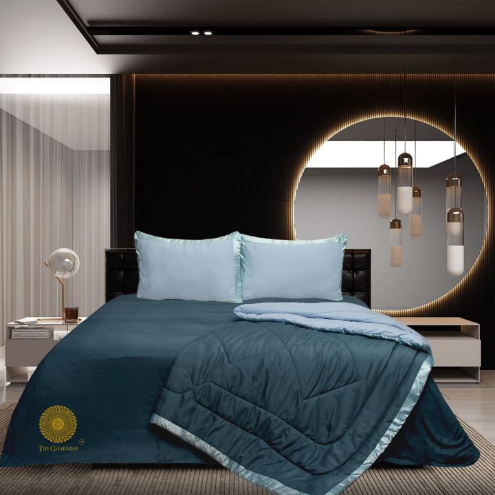 Premium reversible comforter set by The Gharnish featuring a satin border, soft bedding with elegant design and reversible style.
