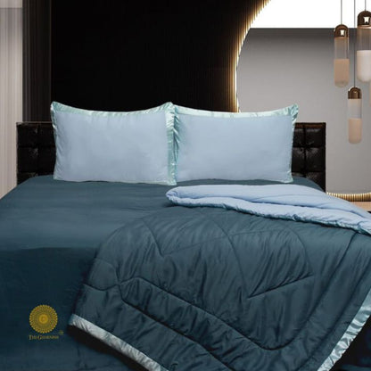 Premium reversible comforter set by The Gharnish featuring a satin border, cozy bedding with stylish, elegant design.