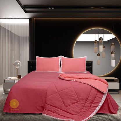 Premium reversible comforter set by The Gharnish featuring a satin border, showcasing soft, luxurious bedding with elegant design.