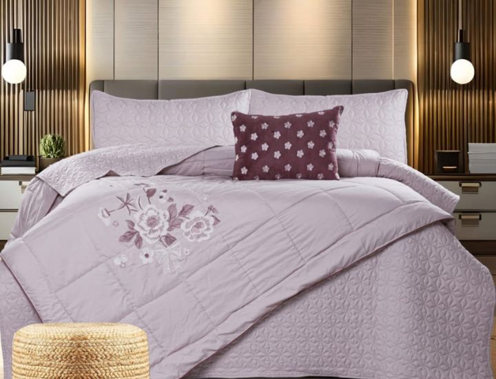 Quilted bedcover with embroidery, Orchid design, part of The Gharnish 5-piece bedding set, featuring intricate floral patterns.