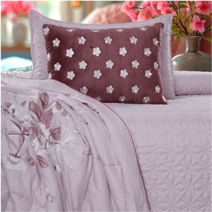 Set of five quilted bedding bedcovers with embroidered orchid designs by The Gharnish, elegant and decorative for bedroom decor.