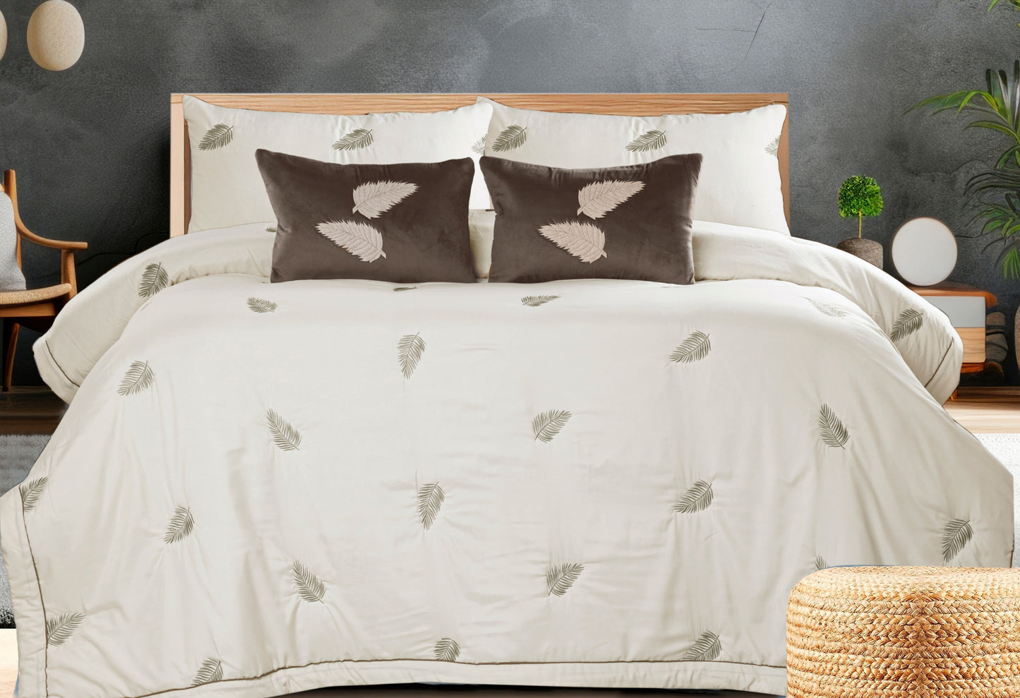 The Gharnish Royale 6-piece all-weather comforter set with intricate embroidery, shown on a bed with matching bedding accessories.